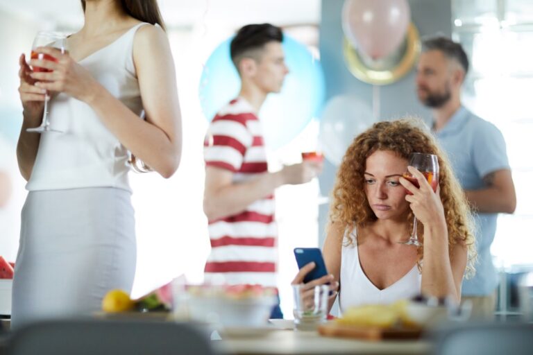 social anxiety solutions, woman feeling anxious in a party