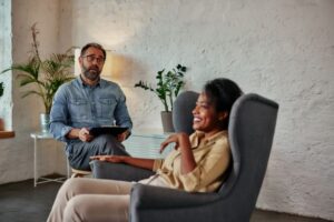 Reflective self-awareness, therapist talking to a patient